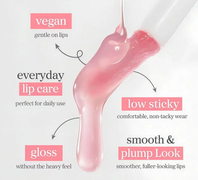 Lip balm or gloss with pink color, dripping from a applicator on a white background.